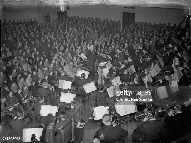 Boyd Neel conducts the London Symphony Orchestra in the first of the Robert Mayer Concerts for Children, in the Central Hall, Westminster, London,...