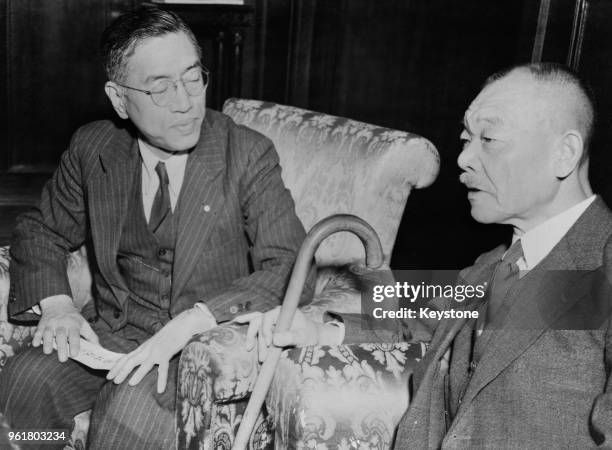 Japanese politician Kuniaki Koiso , a former general of the Imperial Japanese Army, in conference with Toyoichi Nakamura, Japanese Minister at Large,...