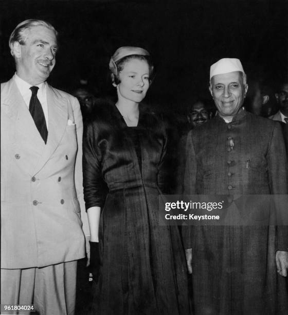 British Foreign Secretary Sir Anthony Eden and his wife Clarissa are met by Indian Prime Minister Jawaharlal Nehru upon their arrival at Palam...