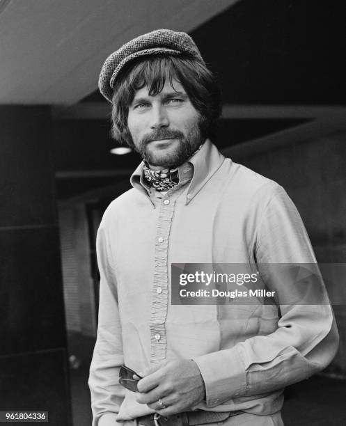 Italian actor Franco Nero arrives at London Airport to star in the new film 'The Virgin and the Gypsy', 14th July 1969. The film begins production in...