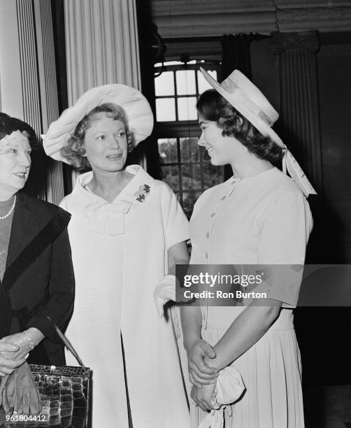 English actress Anna Neagle chats to Heather Sears at Pinewood Studios, during the presentation of the Picturegoer Awards, 14th August 1958. Neagle...