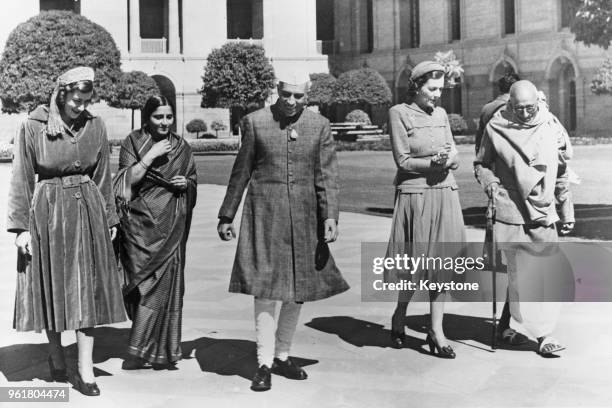 Lady Edwina Mountbatten and her daughter Pamela Mountbatten walking in the grounds of Government House, New Delhi, with Indian Prime Minister...