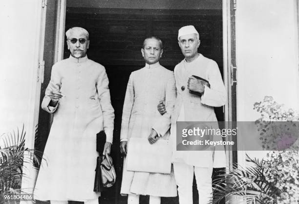 From left to right, Maulana Abul Kalam Azad , President of the Indian National Congress, Asaf Ali, member of the working committee, and Jawaharlal...