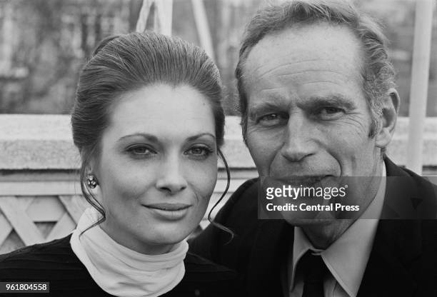 American actor Charlton Heston with actress Hildegarde Neil, his co-star in the film 'Antony and Cleopatra', during a press reception at the...
