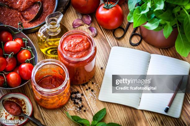 tomato sauce recipe - tomato paste stock pictures, royalty-free photos & images