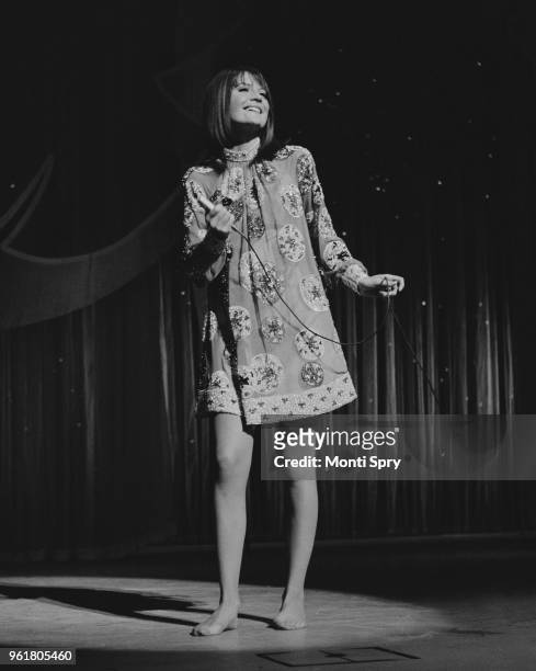 English singer Sandie Shaw rehearses barefoot at the London Palladium, for the next day's Royal Variety Performance, 12th November 1967. Queen...