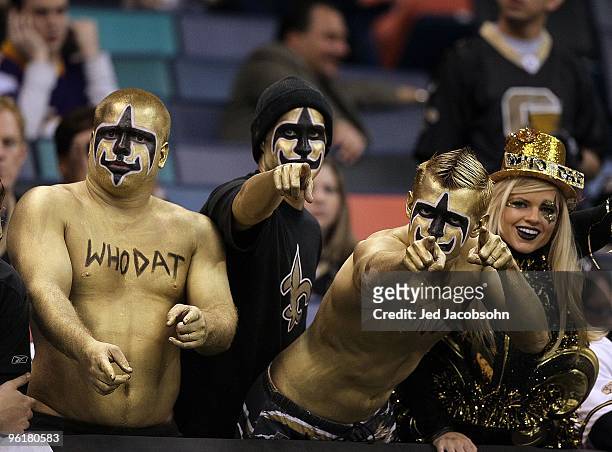 Fans of the New Orleans Saints support the Saints against the Minnesota Vikings during the NFC Championship Game at the Louisana Superdome on January...