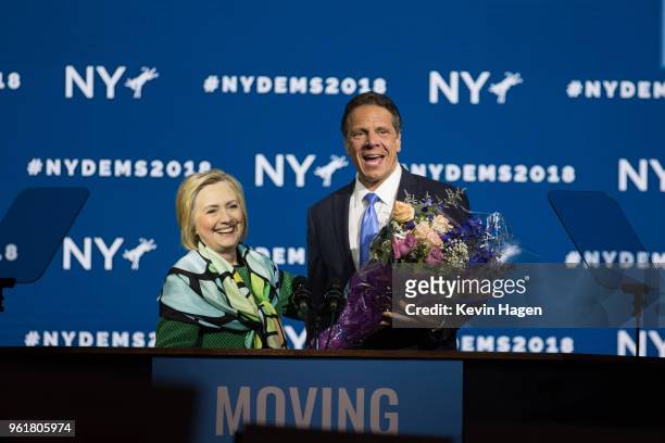 Gov. Andrew Cuomo brings flowers after Hillary Clinton's speech during the New York Democratic convention at Hofstra University on May 23, 2018 in...