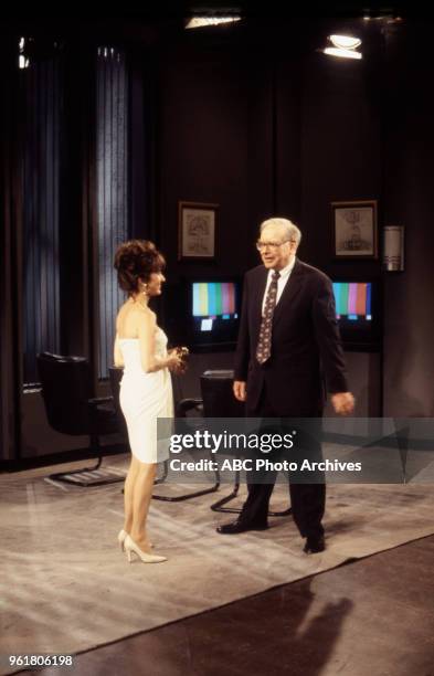 Susan Lucci, Warren Buffett visiting the set of Disney General Entertainment Content via Getty Images's 'All My Children'.