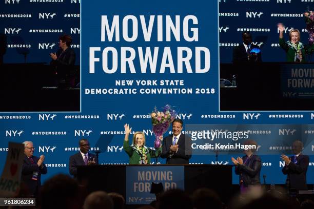Gov. Andrew Cuomo brings flowers after Hillary Clinton's speech during the New York Democratic convention at Hofstra University on May 23, 2018 in...