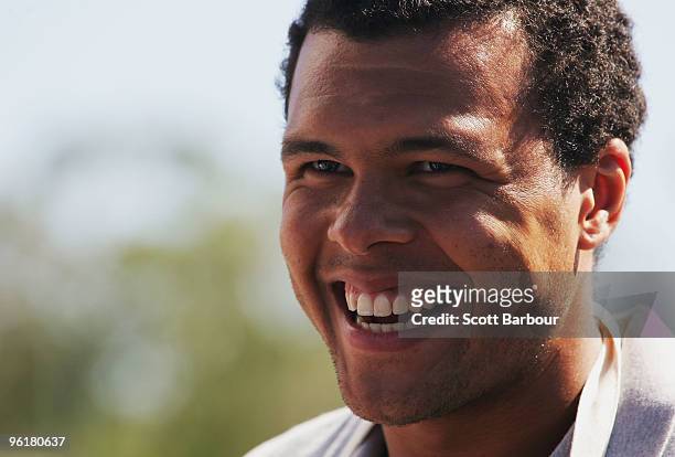 Jo-Wilfried Tsonga of France enjoys a barbecue on Australia Day during day nine of the 2010 Australian Open at Melbourne Park on January 26, 2010 in...
