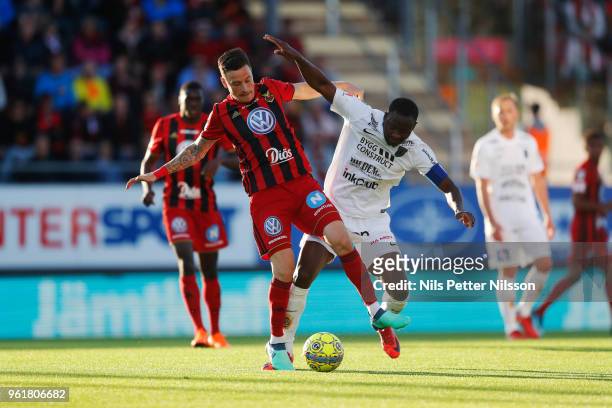 Jamie Hopcutt of Ostersunds FK and Moses Ogbu of IK Sirius FK competes for the ball during the Allsvenskan match between Ostersunds FK and IK Sirius...