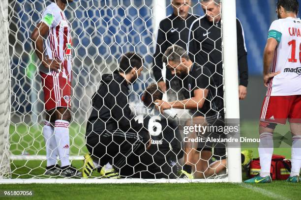 Jean Louis Leca of Ajaccio leaves the pitch injured during the Ligue 1 playoff match between AC Ajaccio and FC Toulouse at Stade de la Mosson on May...