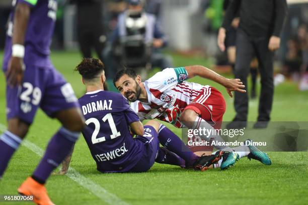 Jimmy Durmaz of Toulouse and Johan Cavalli of Ajaccio during the Ligue 1 playoff match between AC Ajaccio and FC Toulouse at Stade de la Mosson on...