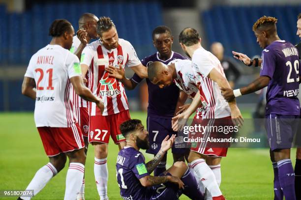 Jimmy Durmaz of Toulouse and players of Ajaccio during the Ligue 1 playoff match between AC Ajaccio and FC Toulouse at Stade de la Mosson on May 23,...