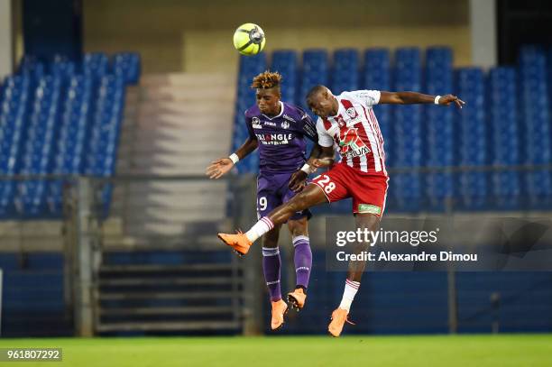 Moussa Maazou of Ajaccio and Jacques Moubandje of Toulouse during the Ligue 1 playoff match between AC Ajaccio and FC Toulouse at Stade de la Mosson...
