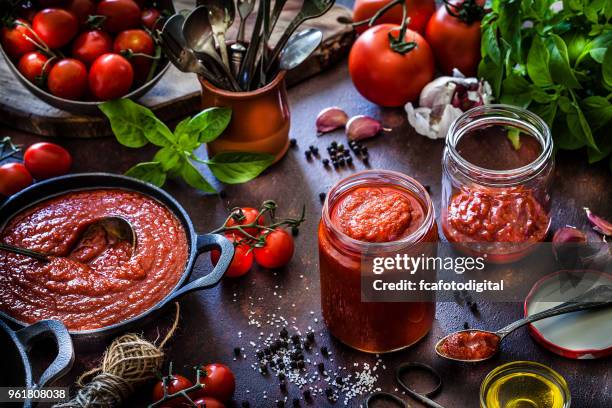 preparing tomato sauce - tomato paste stock pictures, royalty-free photos & images