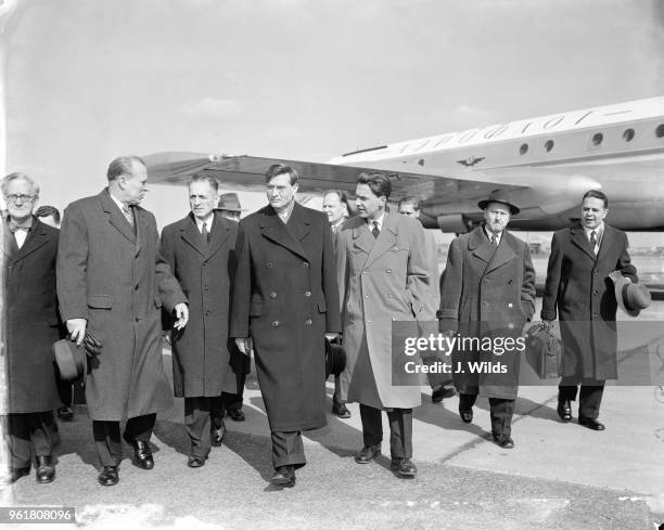 Soviet delegation arrives at London Airport at the invitation of the Anglo-Russian Parliamentary Committee, and is met by Julius Silverman, chairman...