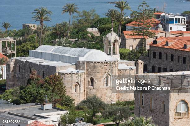 byblos - maronite church of st john the baptist, dating from 1116 ad in the crusader era. - circa 2nd century - fotografias e filmes do acervo