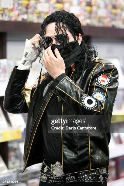 Michael Jackson impersonator Pete Carter attends the Michael Jackson's 'This Is It' midnight madness DVD release celebration at Best Buy on January...