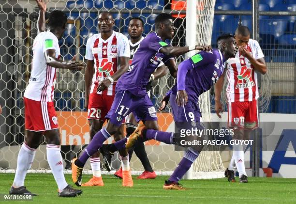 Toulouse's French forward Yaya Sanogo celebrates after scoring a goal during the French L1/L2 first leg play-off football match between Ajaccio and...