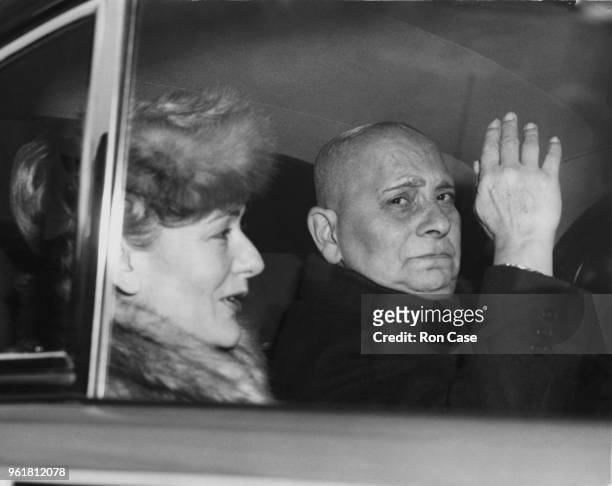 Austrian-American film director Erich Von Stroheim arrives at Victoria in London with his partner, actress Denise Vernac , to open a 12-week season...