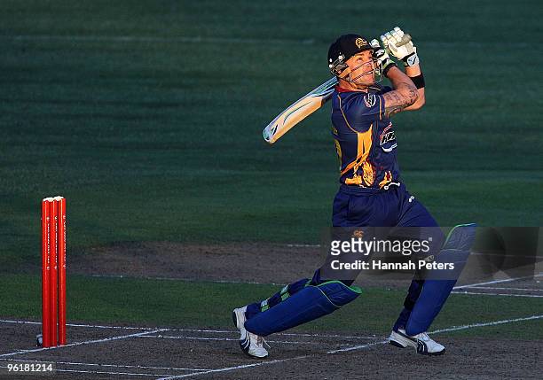 Brendon McCullum of Otago smashes the ball away for six runs during the HRV Cup Twenty20 match between the Auckland Aces and the Otago Volts at Colin...