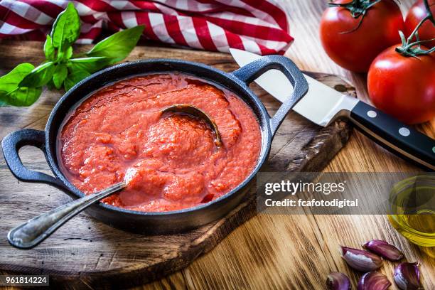 preparing tomato sauce - tomato paste stock pictures, royalty-free photos & images