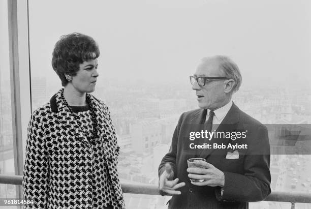 Marion Lascelles, Countess of Harewood chats to conductor Paul Steinitz during a reception at Martini Terrace, New Zealand House, London, to...