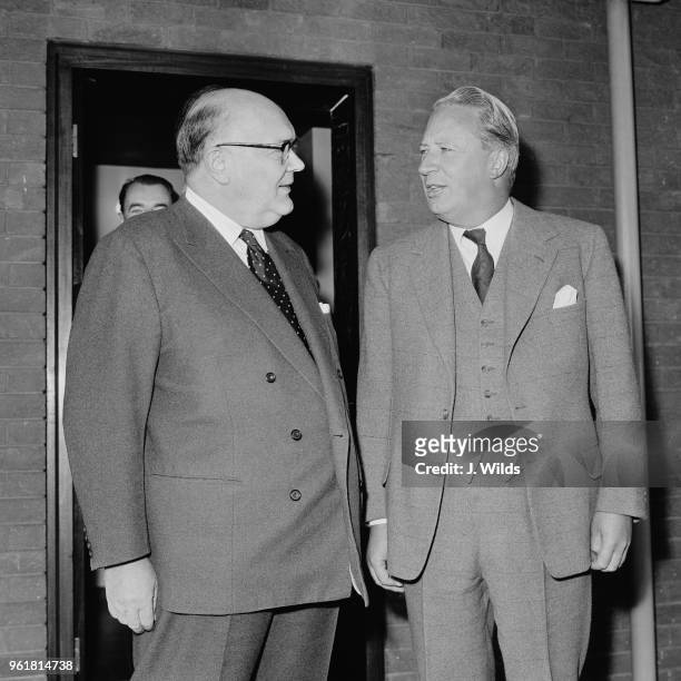 Belgian Foreign Minister Paul-Henri Spaak with the Lord Privy Seal Edward Heath after Spaak's arrival at London Airport for talks on the Common...