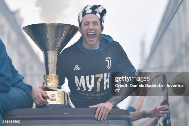 Federico Bernardeschi of Juventus cheers the fans during a victory Parade by Juventus on May 19, 2018 in Turin, Italy.