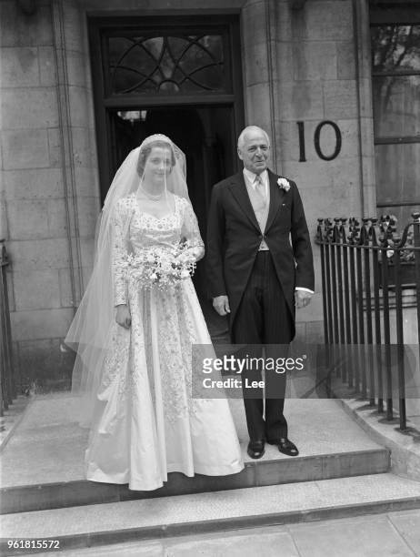 Frances Roche leaves her home in Wilton Crescent, London with her father Lord Fermoy , for her wedding to John Spencer, Viscount Althorp, later the...