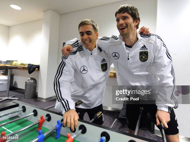 Philipp Lahm and Arne Friedrich of Germany record a Mercedes Benz television advert for the FIFA Wolrd Cup 2010 at the Mercedes Benz Arena on January...