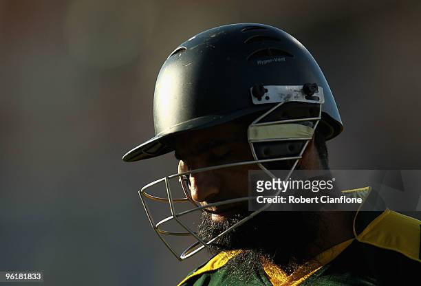Mohammad Yousuf of Pakistan walks from the ground after he was bowled by Shane Watson of Australia during the third One Day International between...
