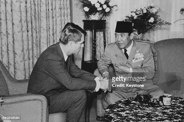 Attorney General Robert F. Kennedy and President Sukarno of Indonesia meet at the Imperial Hotel in Tokyo, Japan over the crisis in Malaysia, 21st...