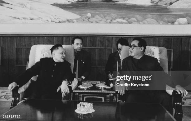 Chinese leader Deng Xiaoping in conversation with Kim Il-sung , the leader of North Korea, during a visit to North Korea, September 1978.