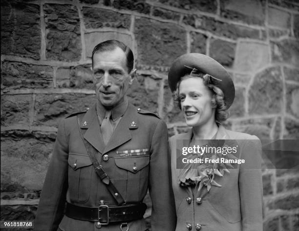 British Army officer Major R. T. Stanyforth , Equerry to the Duke of Gloucester, with his bride P. E. Daniel after their wedding at the King's Chapel...