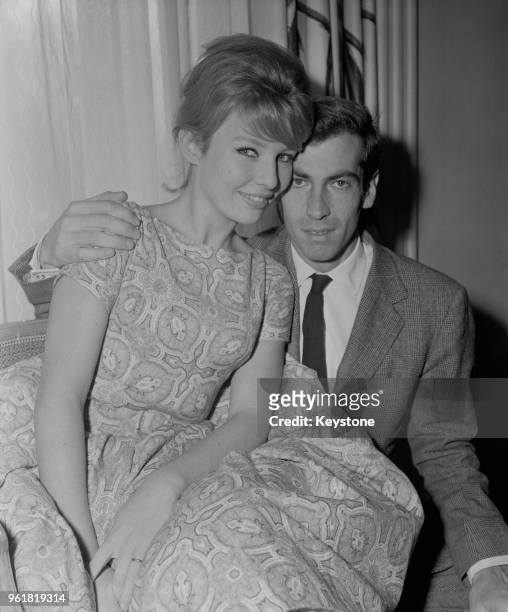 French film director and screenwriter Roger Vadim at the Savoy Hotel in London with his wife, actress Annette Stroyberg , 14th December 1958. She is...