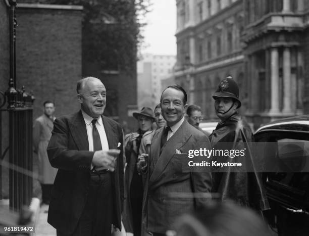 Richard Stokes , the Lord Privy Seal, and barrister Sir Hartley Shawcross , President of the Board of Trade, arrive at 10 Downing Street in London...