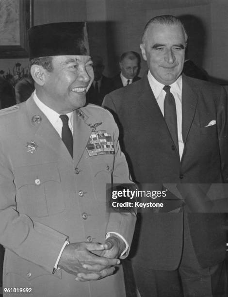 President Sukarno of Indonesia is received by French President Georges Pompidou during a three-day unofficial visit to Paris, France, 20th October...