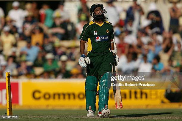 Mohammad Yousuf of Pakistan reacts after being bowled by Shane Watson of Australia during the third One Day International between Australia and...