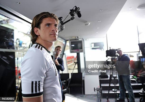 Mario Gomez of Germany poses during a record of a Mercedes Benz television advert for the FIFA Wolrd Cup 2010 at the Mercedes Benz Arena on January...