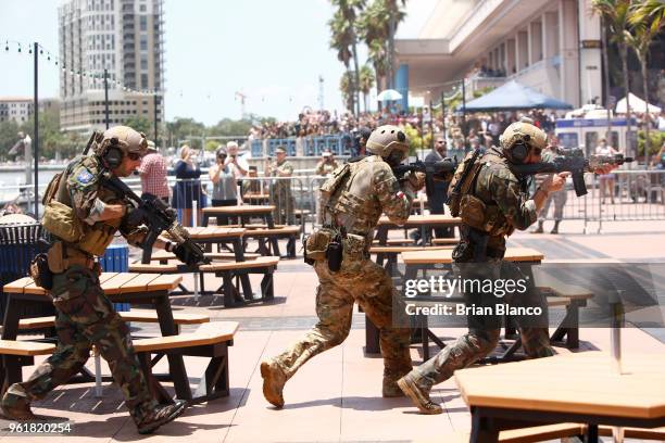 Special operators assault the shoreline while participating in an International Special Operations Forces capabilities exercise, featuring operators...