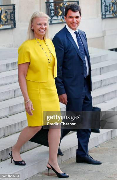 President and CEO Virginia Rometty and IBM France CEO Nicolas Sekkaki leave the Elysee Presidential Palace after a meeting with French President...