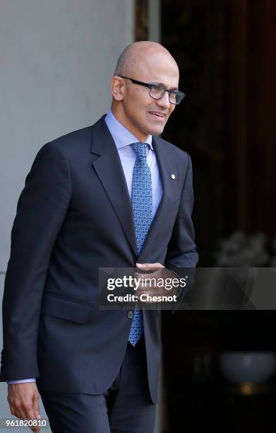 Microsoft CEO Satya Nadella leaves the Elysee Presidential Palace after a meeting with French President Emmanuel Macron on May 23, 2018 in Paris,...