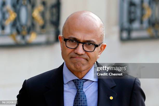 Microsoft CEO Satya Nadella leaves the Elysee Presidential Palace after a meeting with French President Emmanuel Macron on May 23, 2018 in Paris,...