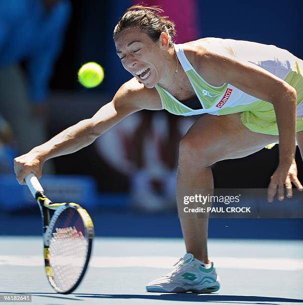 Francesca Schiavone of Italy attempts a return against Venus Williams of the US in their women's singles fourth round match on day eight of the...