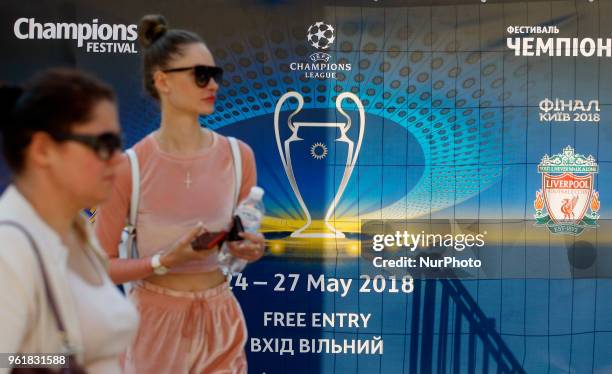 People walk past the site of the 2018 UEFA Champions League Final fan zone in central in Kiev, Ukraine, 23 May, 2018. Kiev is preparing for the 2018...