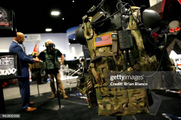 Attendees inspect the latest military technology and gear during the Special Operations Forces Industry Conference on May 23, 2018 in Tampa, Florida....