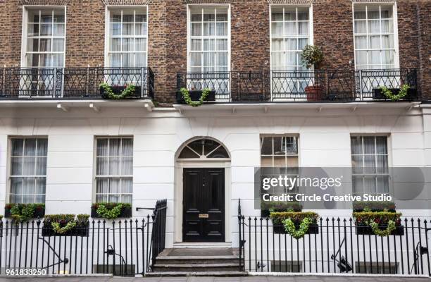 typical house exteriors in london - victorian row house stock pictures, royalty-free photos & images